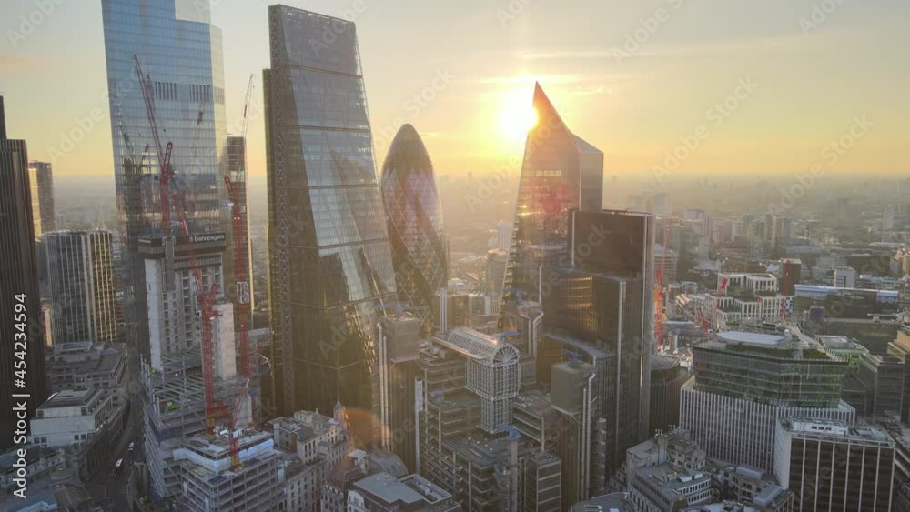 luxury skyscrapers in City financial and economy centre against sunrise sky.