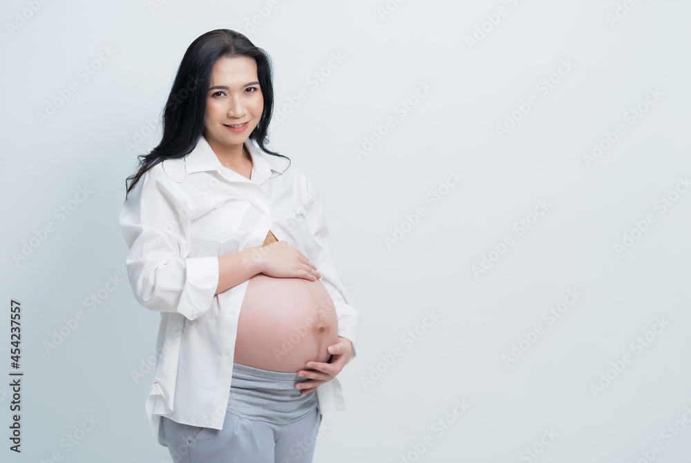 beautiful pregnant women, mother holding baby in pregnant belly
beautiful pregnant women, mother holding baby in pregnant belly