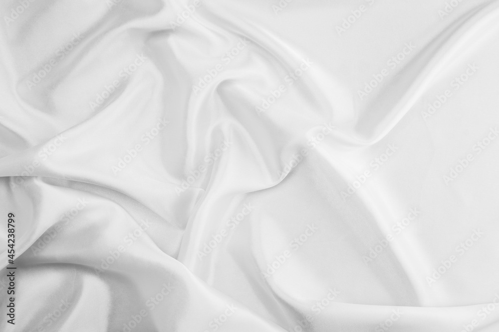White cloth background abstract with soft waves, closeup texture of cloth
