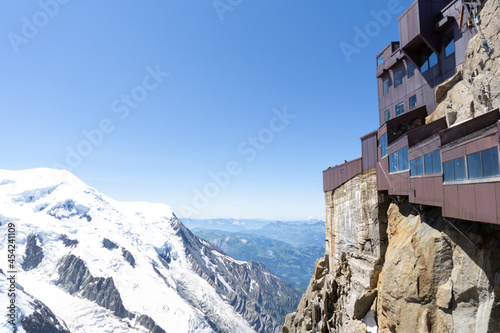 A panoramic view of European Alps on a sunny day. Mount Blanc as a highest mountain in Europe covered with snow and glacier