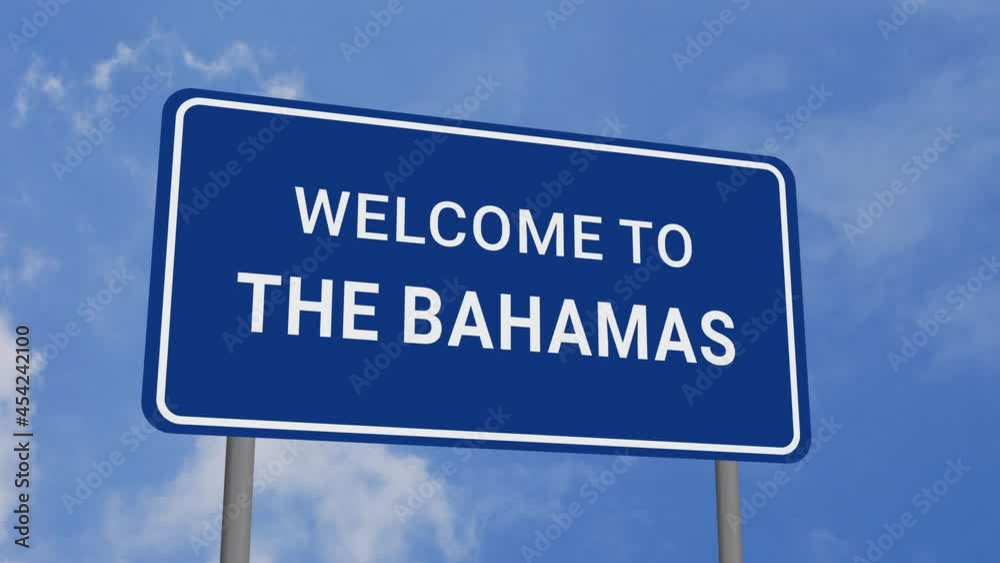 Welcome to The Bahamas Road Sign on Clear Blue Sky with Rapid Moving Clouds Welcome to The Bahamas Road Sign on Clear Blue Sky with Rapid Moving Clouds