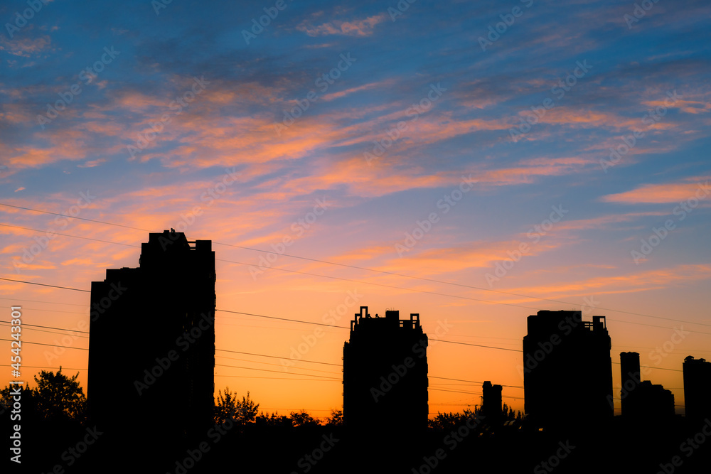 A beautiful view of the city skyline in the early morning, just before sunrise