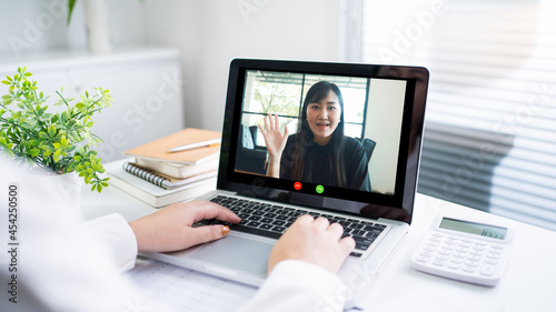 Video call  people online meeting with business partner group startup new normal lifestyle teleconference. happy woman using laptop for Video call and online service concept.