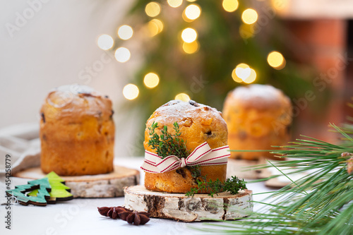 Traditional Italian Christmas cake Panettone with festive decorations 