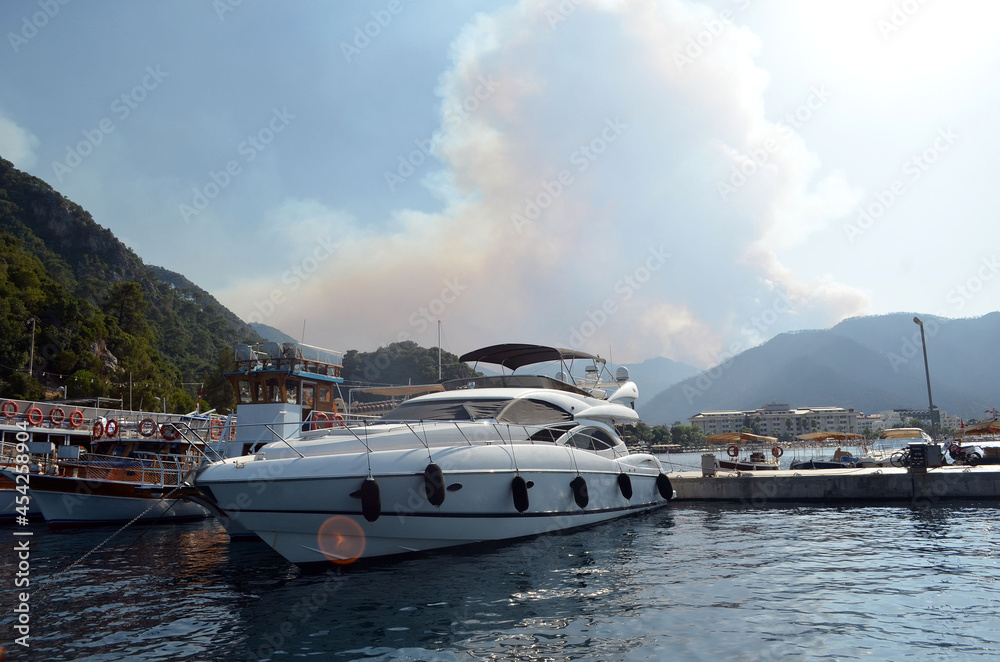 Wildfire in the forest near a resort town Icmeler, Turkey. Summer 2021 Wildfire in the forest near a resort town Icmeler, Turkey. Summer 2021