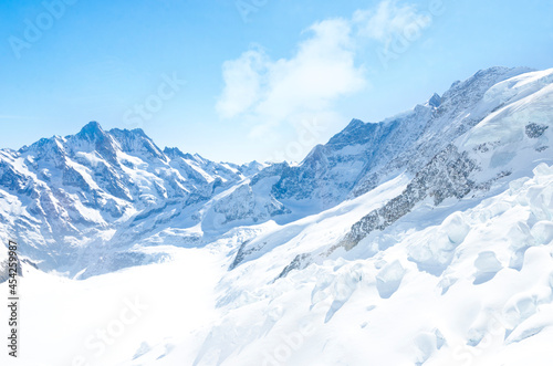 Alps Eiger and Jungfrau dramatic snowy mountain peaks panorama Switzerland. © Tanya
