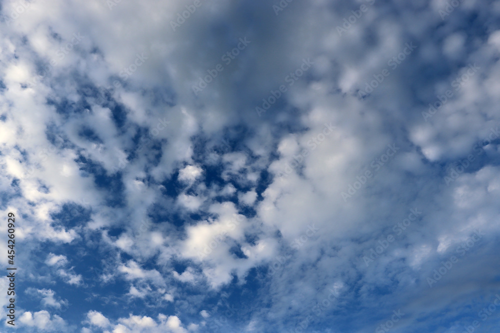 Beautiful blue sky with white and gray clouds Beautiful blue sky with white and gray clouds