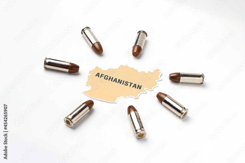 Afghanistan map logo icon with real gun bullet ammo around country on white background in concept of middle east war and conflict Afghanistan map logo icon with real gun bullet ammo around country on white background in concept of middle east war and conflict