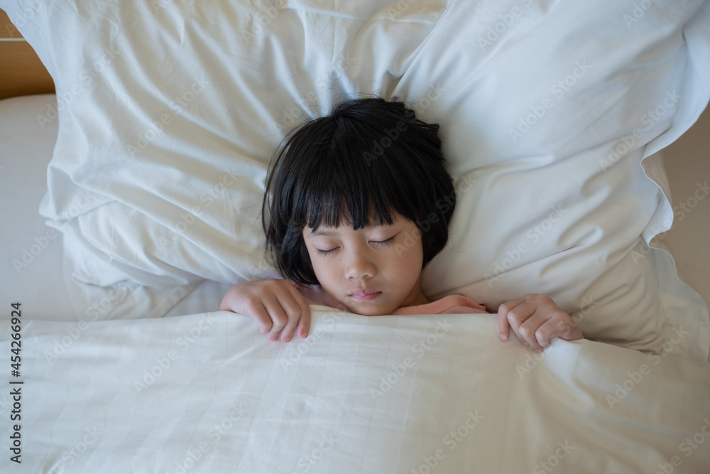 asian kid sleep on bed, sick child
asian kid sleep on bed, sick child