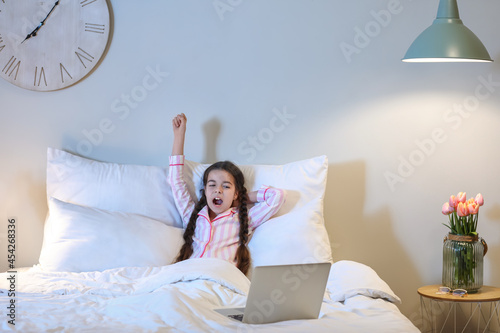 Tired girl watching cartoon...