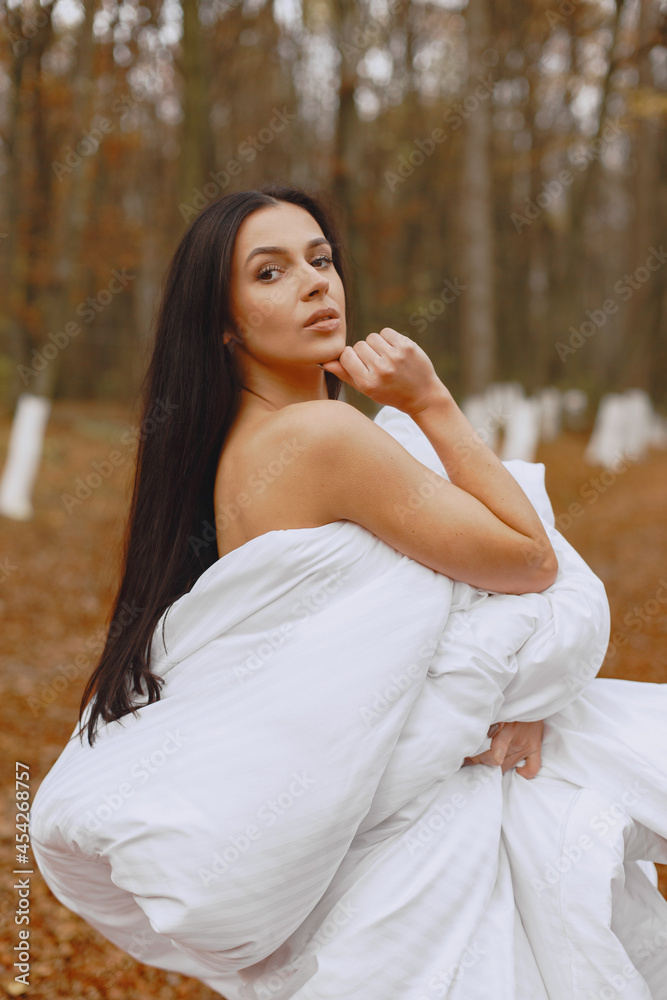 Picture of beautiful woman in white bathrobe Picture of beautiful woman in white bathrobe