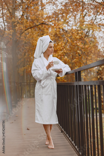 Picture of beautiful woman in white bathrobe © prostooleh
