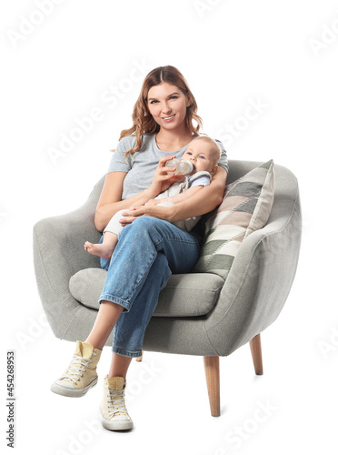 Young mother giving water t...