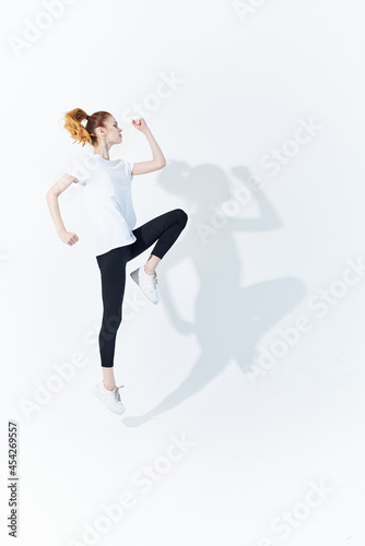 Fototapeta Naklejka Na Ścianę i Meble -  woman in sports uniform energy lifestyle studio fitness