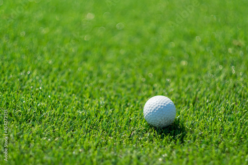 Golf balls on artificial grass with blur background 