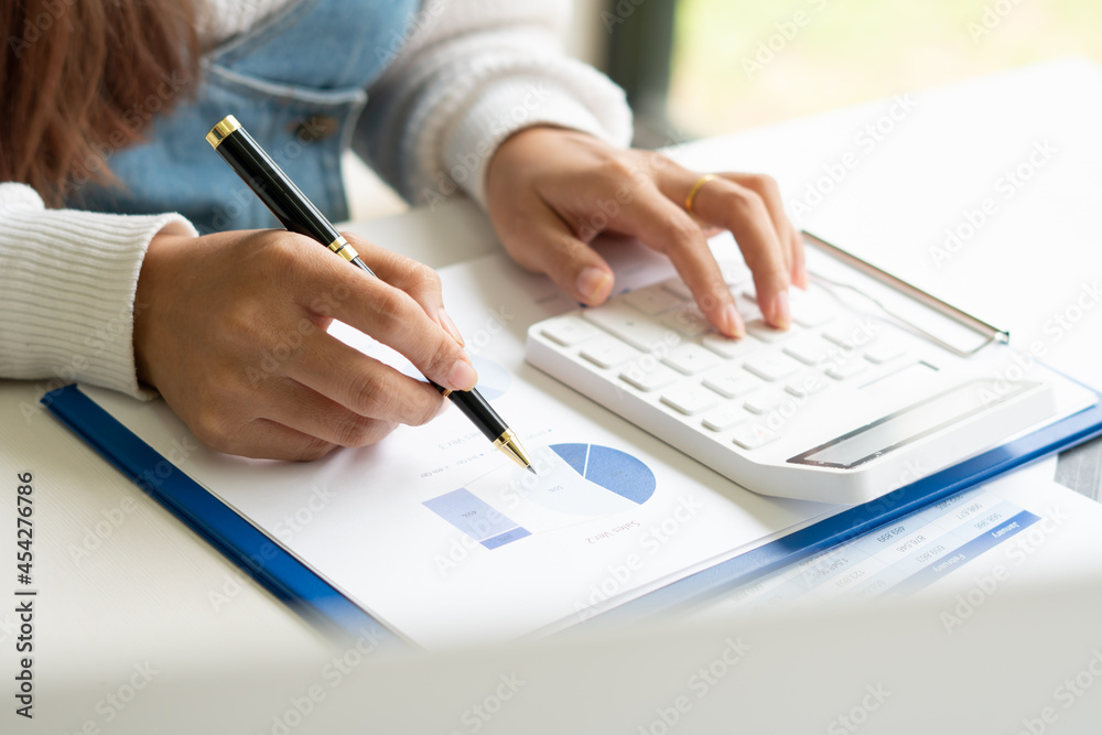 Businessman is deeply reviewing a financial report for a return on investment or investment risk analysis. Businessman is deeply reviewing a financial report for a return on investment or investment risk analysis.
