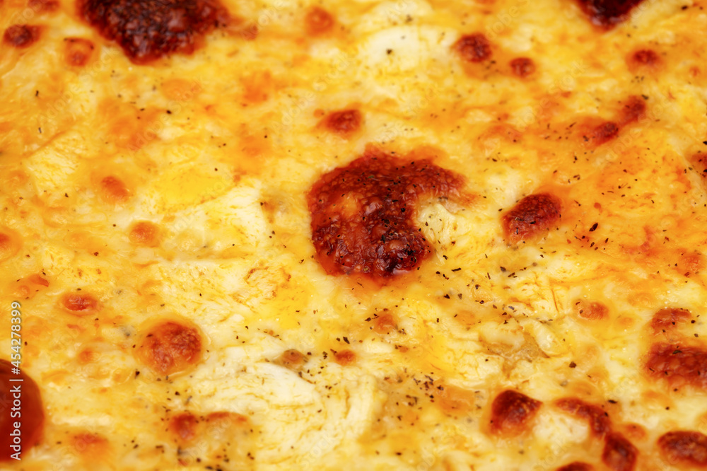 four cheeses pizza , or Pizza quattro formaggi, baked with cheeses melted four cheeses pizza , or Pizza quattro formaggi, baked with cheeses melted