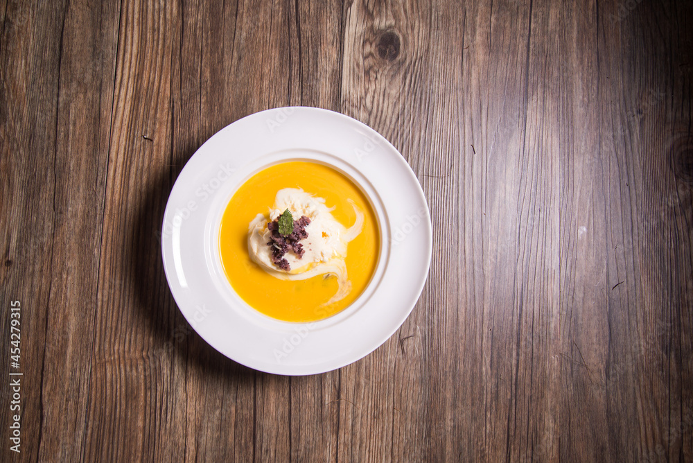 chilled mango fruit sago creamy sweet soup with vanilla ice cream on wood background asian halal banquet menu chilled mango fruit sago creamy sweet soup with vanilla ice cream on wood background asian halal banquet menu