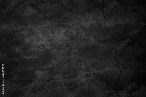 Close up retro plain dark black cement & concrete wall background texture for show or advertise or promote product and content on display. © Manitchaya