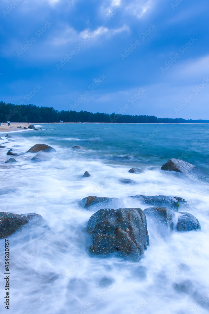 Seascape view of a tropical beach at dusk. Seascape view of a tropical beach at dusk.