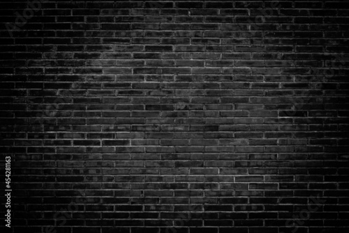 Black brick wall texture for pattern background.