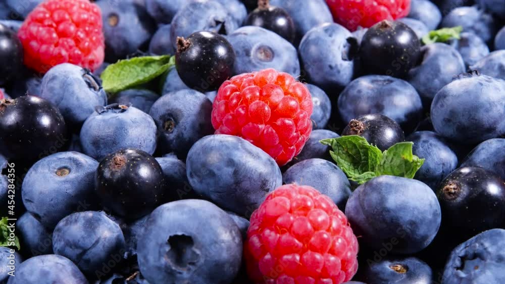 Berries, Various colorful background, Juicy Ripe Summer berries. Mint leaves, Raspberry, Blueberry close-up, Bio Fruits, Healthy eating, Vegan food, diet. 4K UHD video Berries, Various colorful background, Juicy Ripe Summer berries. Mint leaves, Raspberry, Blueberry close-up, Bio Fruits, Healthy eating, Vegan food, diet. 4K UHD video