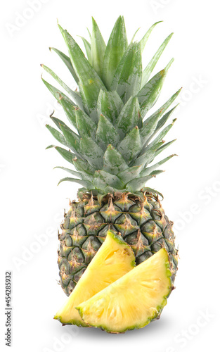 Whole pineapple and pineapple slice isolated on white background