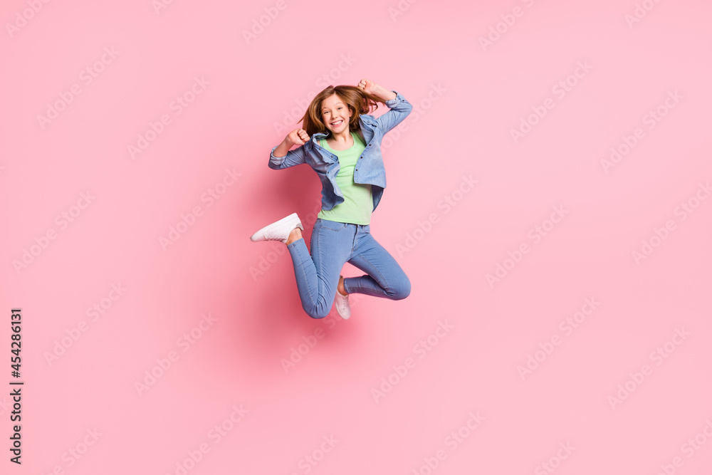 Full length body size photo jumping up happy nice girl isolated pastel pink color background