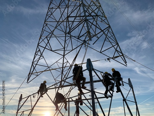 Montaje recrecido sobre torre de 400kV en línea de red eléctrica española photo