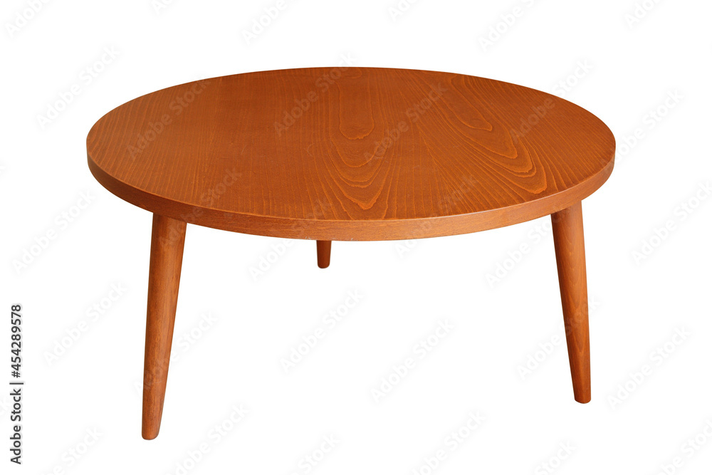 Round wooden coffee table on three legs with a beautiful wood texture. Isolated on a white background Round wooden coffee table on three legs with a beautiful wood texture. Isolated on a white background