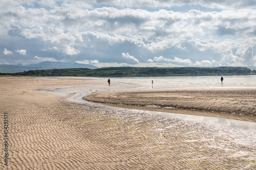 Looking east on Carradale Bay Beach in Argyll and Bute, Scotland photo