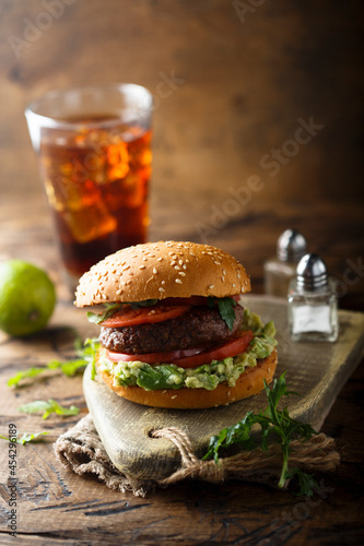 Traditional beef burger with guacamole