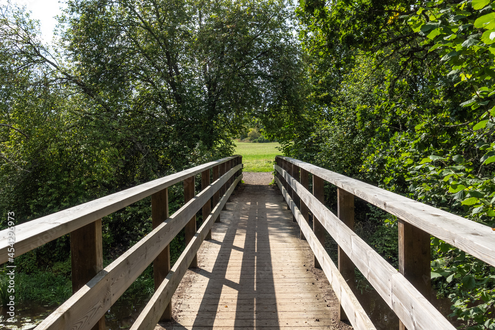 Wooden bridge on a hiking path in Sweden's countryside