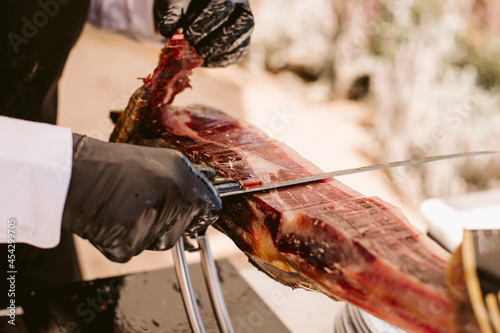 Iberian ham cutter. Traditional spanish jamon serrano pata negra.  