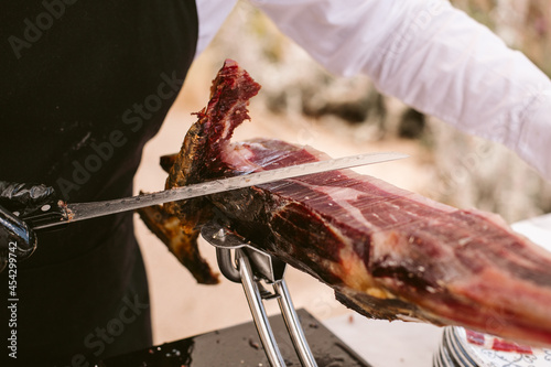 Iberian ham cutter. Traditional spanish jamon serrano pata negra.  