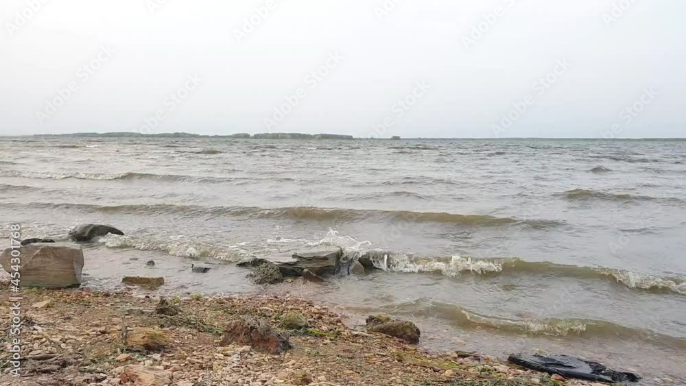 strong wave on the reservoir, view from below strong wave on the reservoir, view from below