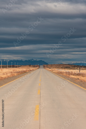 Highway theme picture. Highway concept picture. Amazing autumn. The natural landscape of the Patagonian plateau. Travel in Chile in South America.