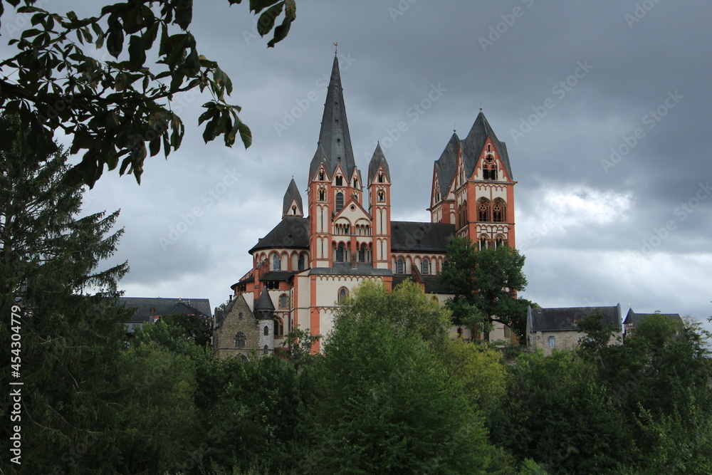 Limburg Castle with landscape and dark sky