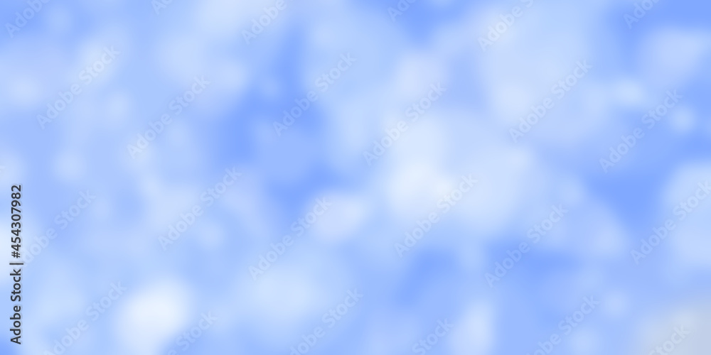 Abstract blue background with bokeh effect. Blurred defocused lights in white colors
