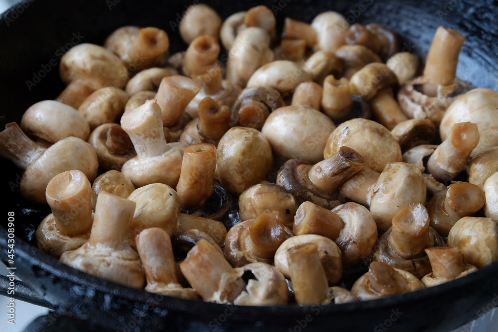 texture of mushrooms fried in sunflower oil close up texture of mushrooms fried in sunflower oil close up