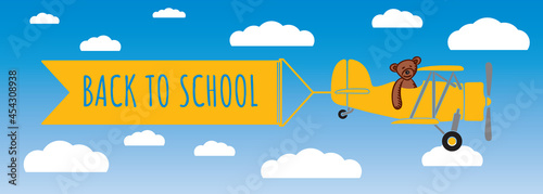 Back to School Panoramic Cartoon Style Creative Concept with Teddy Bear Flying Retro Airplane or Aircraft with Advertising Banner - Clouds and Logo Lettering on Sky Background - Mixed Graphic Design