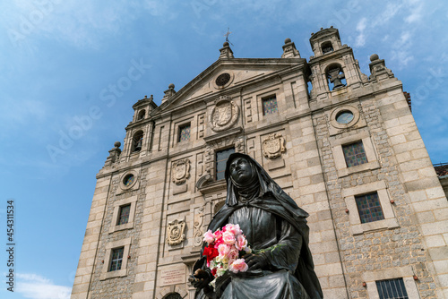 View of the Church and Convent of Santa Teresa with the sculpture of St. Teresa of Jesus. Avila, Spain