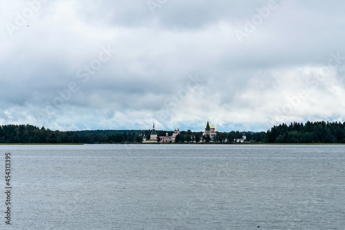 Russia, Valdai, August 2021. A distant view of the Orthodox monastery on the island.