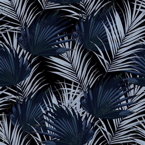 Fashionable seamless tropical pattern with blue tropical fan palm leaves on a black background. Beautiful exotic plants. Trendy summer Hawaii print. 