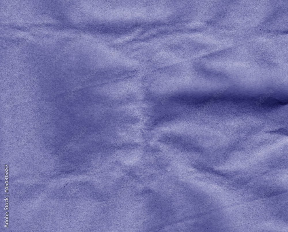 Crafted crumpled paper for background and desing in blue tone.