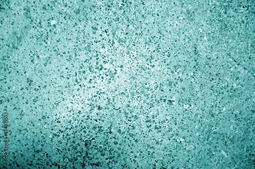 Old stone wall close-up in cyan tone.