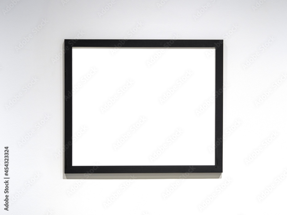 Photo frame mockup, black frame with white blank sheet on the wall. Space for text. Photo frame mockup, black frame with white blank sheet on the wall. Space for text.
