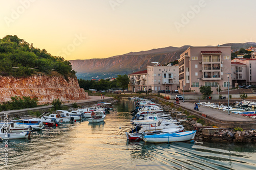 Fototapeta Naklejka Na Ścianę i Meble -  Sunset on the beach in Novi Vinodolski Croatia	