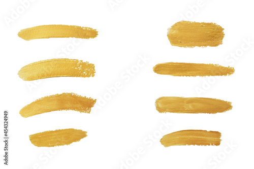 Gold paint stroke set. Gold brush abstract art illustration. Gold glittering design art brush stroke. creative set yellow paint isolated collection. Design golden stroke effect brush color painting.