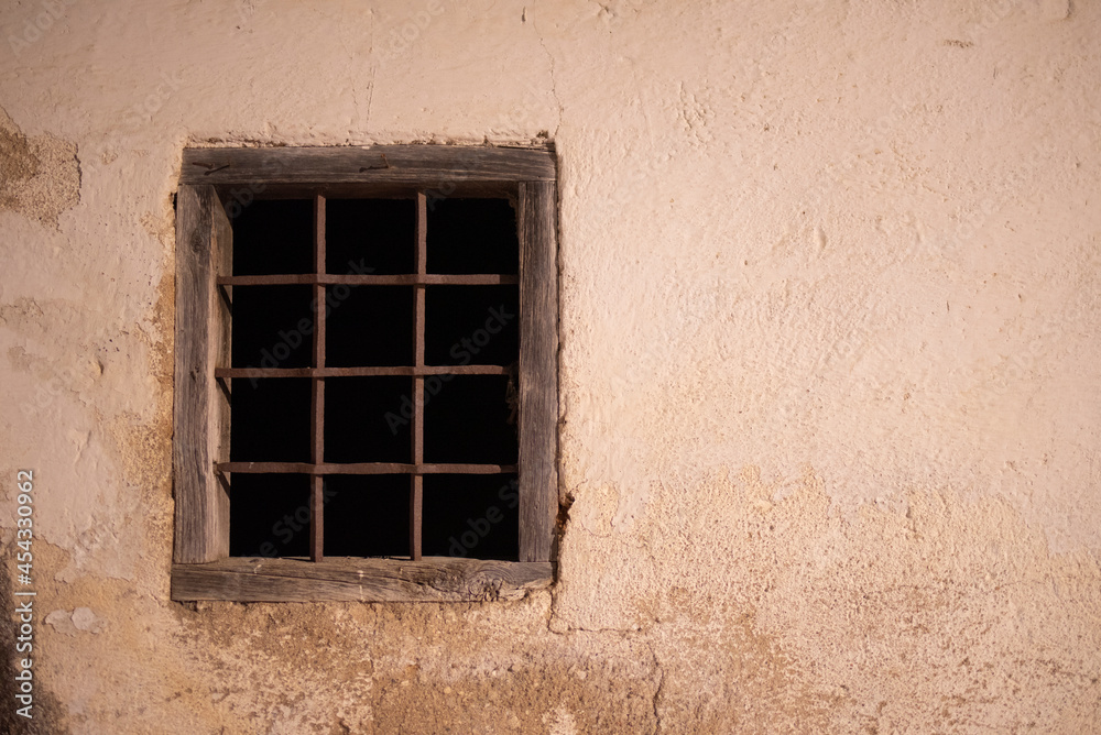 old window with iron bars old window with iron bars